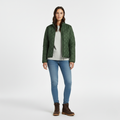 Front view of a green diamond quilted jacket worn open with a stand collar
